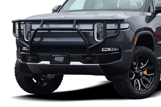 Front view of a black off-road vehicle with a grille guard on a white background