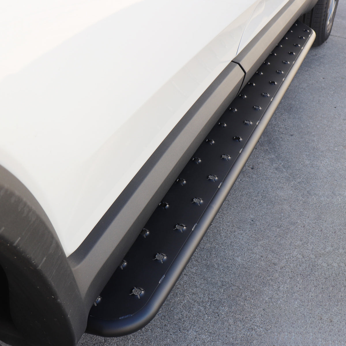 Pictured: Rivian Stainless Steel Running Boards (side steps) for R1S/SUV (Stealth Black) [RW400-1BP-R1S]